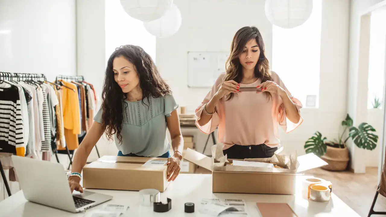 Entrepreneurs implementing systems and delegation to create leverage and scale their business in 2026