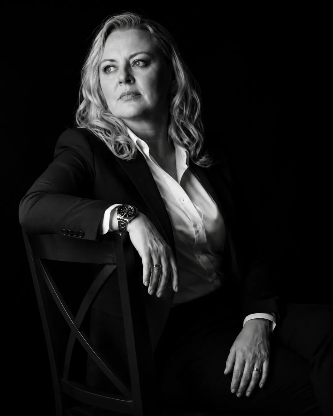 Andrea Florescu, seated executive portrait — fractional leadership consultant